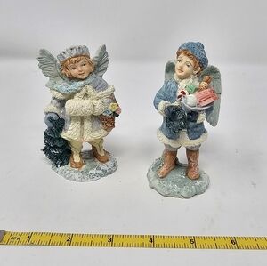 Charming Angel Figurines with Blue and Cream Accents